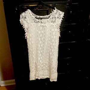 It is nameless but I love this dress! It’s says Large but it is a small! Cream